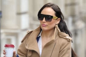 File photo dated 10/01/14 of Chalottte Devaney leaving Bristol Crown Court, she has been cleared of kidnapping a club boss who failed to pay them ?42,000 in wages. PRESS ASSOCIATION Photo. Issue date: Friday January 31, 2014. In March 2012, she recruited 60 lapdancers to work for Curtis Woodman, 34, at his pop-up nightclub during the famous Cheltenham Festival. Authorities closed the Embassy Club in Cheltenham, Gloucestershire, on its third night because the dancers stripped off - despite rules ordering them to wear nipple tassels and bikinis. Mr Woodman refused to pay Devaney and the lapdancers more than ?42,000 they had earned during the club's first two nights. See PA story COURTS Kidnap. Photo credit should read: Tim Ireland/PA Wire