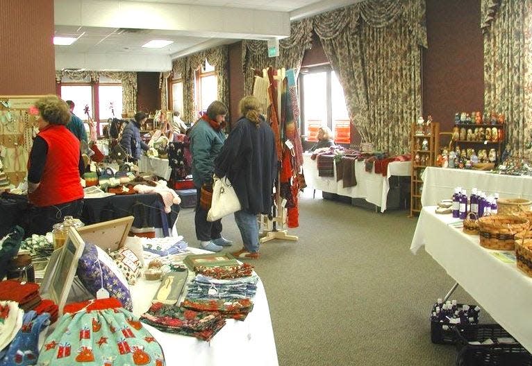 Shoppers are checking out the variety of items available at the 2013 Holiday House bazaar, co-sponsored by CASA.