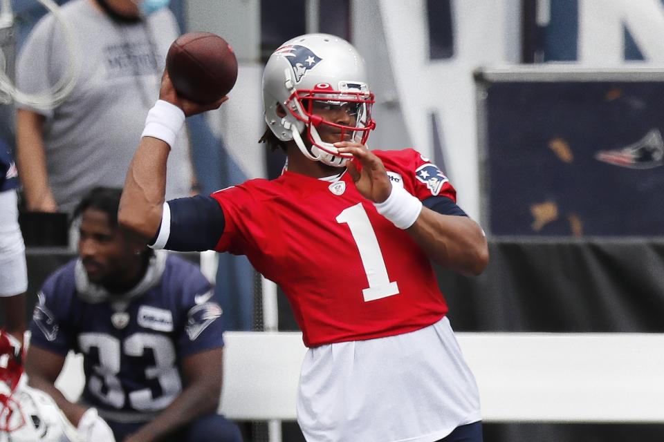 New England Patriots quarterback Cam Newton (1) warms up before an NFL football training camp scrimmage, Friday, Aug. 28, 2020, in Foxborough, Mass. (AP Photo/Michael Dwyer, Pool)