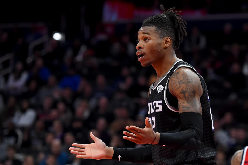 Richaun Holmes standing on a basketball court.