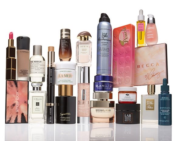 A display of nearly two dozen beauty products sold by Estee Lauder.