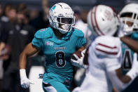 Coastal Carolina wide receiver Tyson Mobley runs for a touchdown against Massachusetts during the first half of an NCAA college football game on Saturday, Sept. 25, 2021, in Conway, S.C. (AP Photo/Chris Carlson)