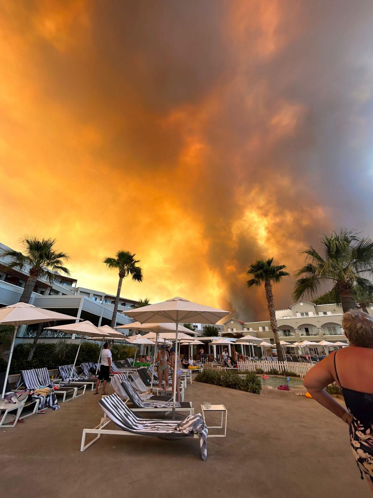 A British tourist has spoken of a “traumatic” escape from her hotel in Rhodes, which she was told was hours later caught alight in the wildfires spreading across Greece (Demi Kemp)