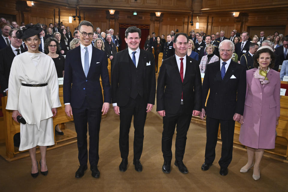 From left, Suzanne Innes-Stubb, wife of President of Finland Alexander Stubb, Speaker of Sweden's Parliament Andreas Norlén, Deputy Speaker of the Parliament Kenneth G Forslund, Swedish King Carl Gustaf and Queen Silvia pose for a group photo in the second chamber of the Sweden's Parliament (Riksdag) on the occasion of his visit, in Stockholm, Tuesday, April 23, 2024. (Claudio Bresciani/TT News Agency via AP)