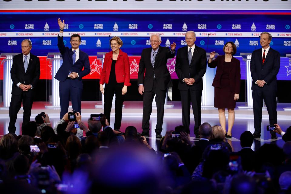 From left, Democratic presidential candidates, former New York City Mayor Mike Bloomberg, former South Bend Mayor Pete Buttigieg, Sen. Elizabeth Warren, D-Mass., Sen. Bernie Sanders, I-Vt., former Vice President Joe Biden, Sen. Amy Klobuchar, D-Minn., and businessman Tom Steyer, participate in a Democratic presidential primary debate at the Gaillard Center in Charleston, co-hosted by CBS News and the Congressional Black Caucus Institute. 