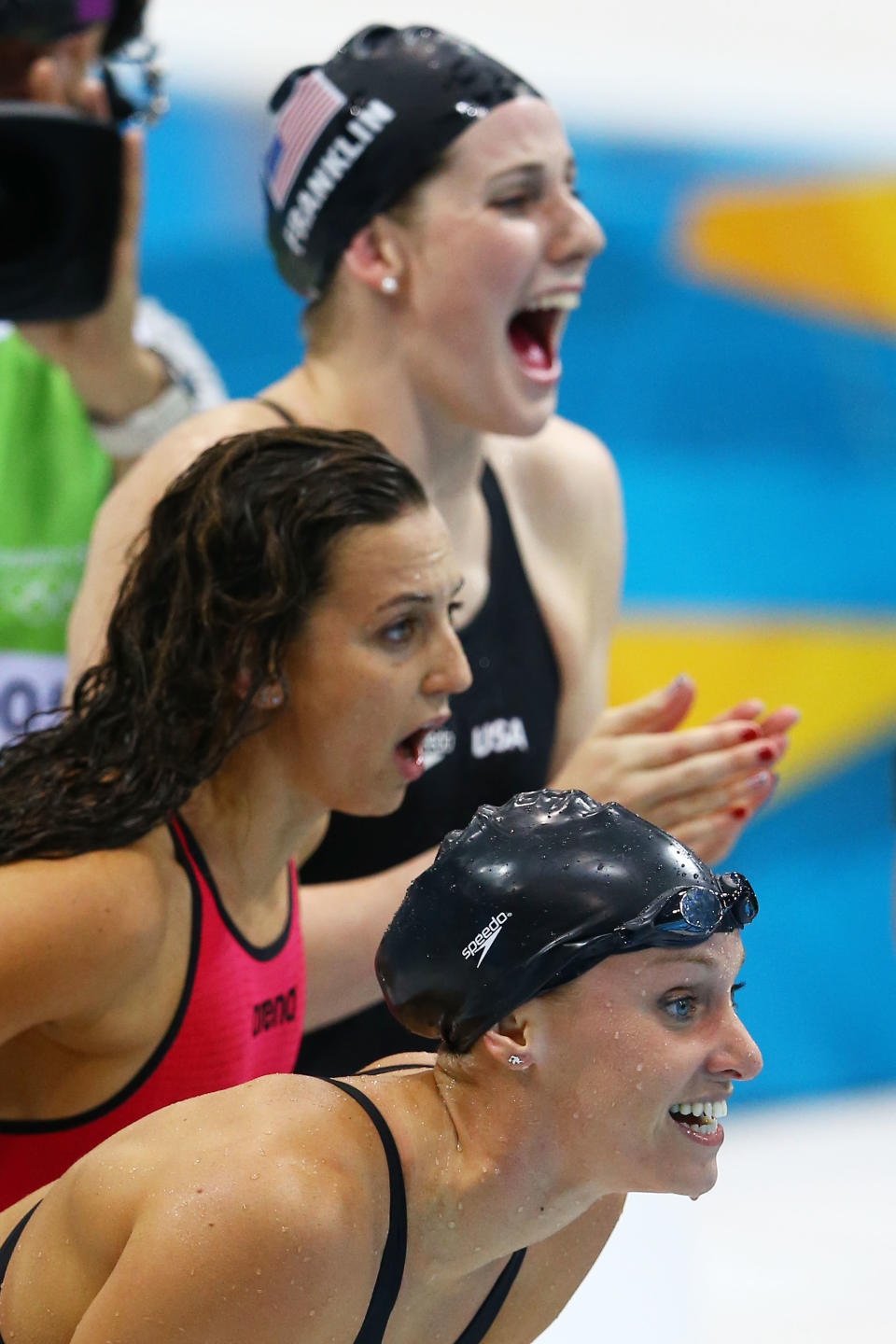 Dana Vollmer, Missy Franklin, and Rebecca Soni of the United States cheer on team mate Allison Schmitt in the Women's 4x100m Medley Relay on Day 8 of the London 2012 Olympic Games at the Aquatics Centre on August 4, 2012 in London, England. (Photo by Al Bello/Getty Images)