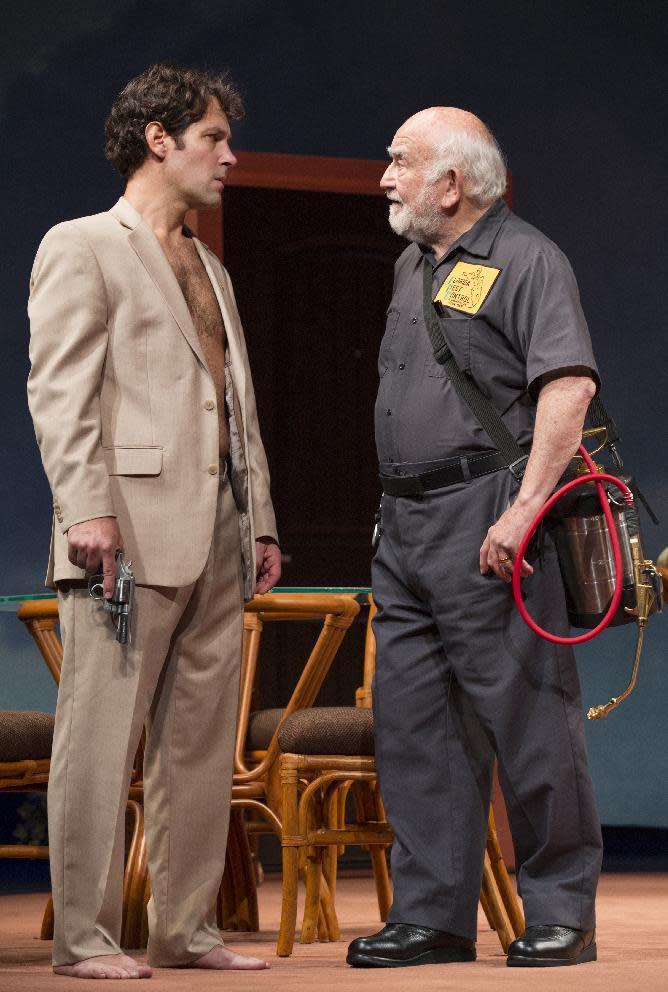 This theater image released by The O + M Company shows Paul Rudd, left, and Ed Asner during a performance of "Grace," at the Cort Theatre in New York. (AP Photo/The O + M Company, Joan Marcus)