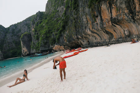 Tourists take photo as they visit Maya bay in Krabi province, Thailand May 22, 2018. REUTERS/Soe Zeya Tun