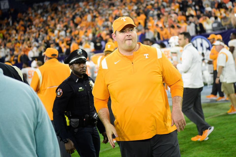 Tennessee Head Coach Josh Heupel walks off the field after losing to Purdue 48-45 at the 2021 Music City Bowl NCAA college football game at Nissan Stadium in Nashville, Tenn. on Thursday, Dec. 30, 2021.