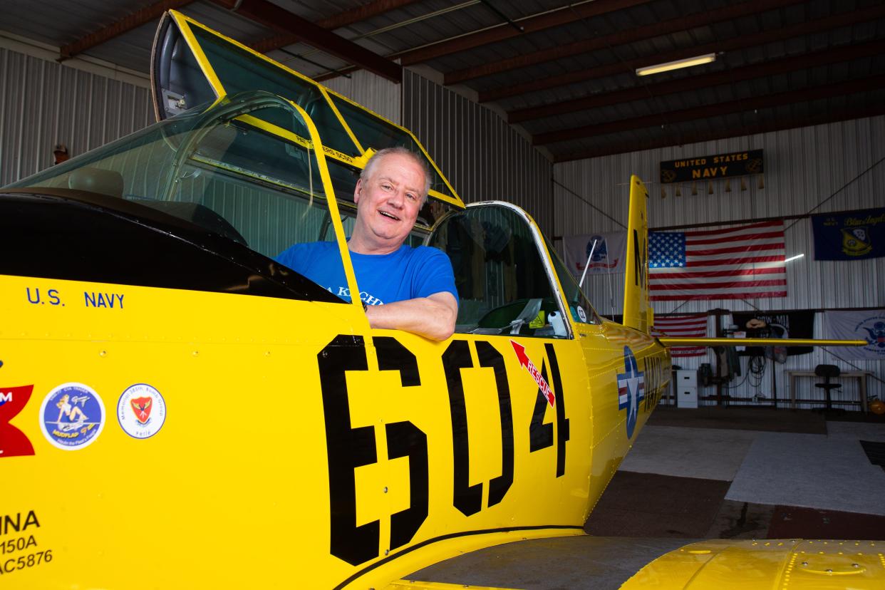 Damian Dieter poses for a portrait while sitting in the cockpit of his 1976 Varga Kachina 2150 A on Wednesday, May 8, 2024, in his hangar at South Bend International Airport.