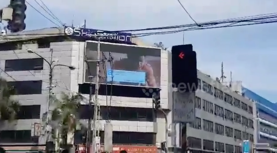 Drivers were chocked - and left in fits of laughter - after porn popped up on the billboard. Photo: Newsflare