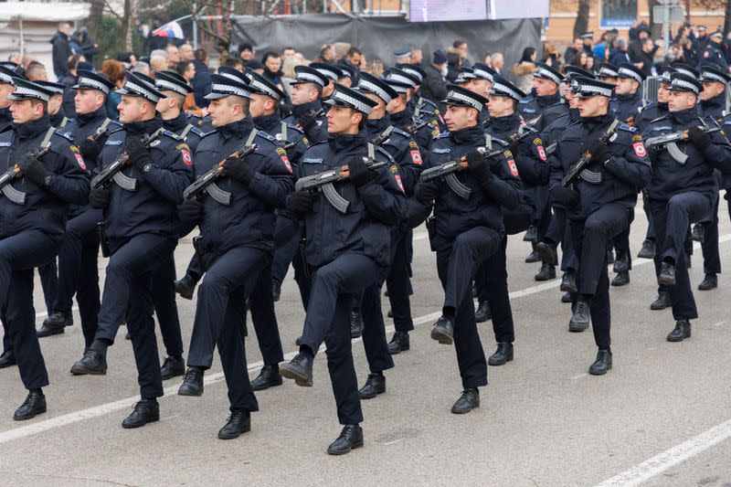 Police march during parade celebrations to mark their autonomous Serb Republic's national holiday, in Banja Luka