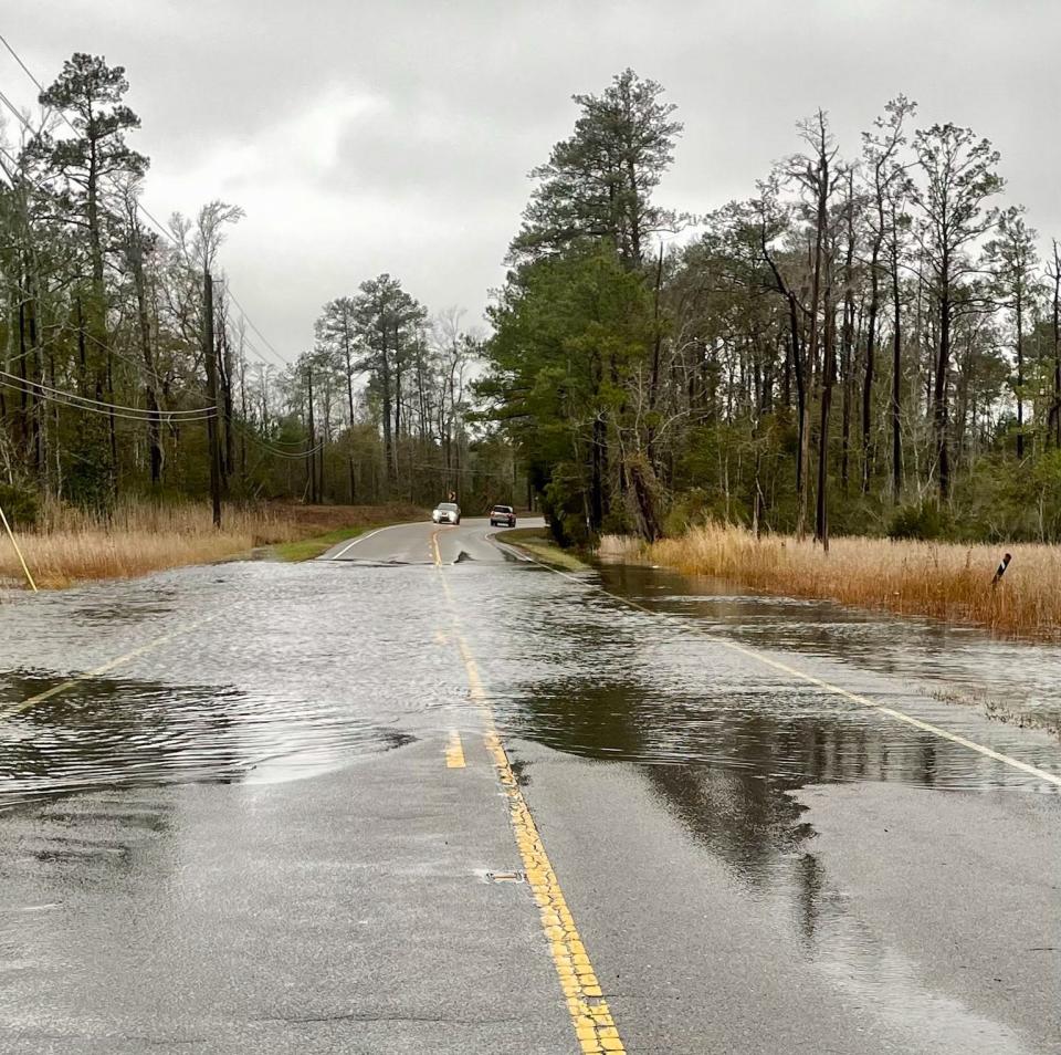 Flooding on River Road in Leland about 1.5 miles south of Rabon Way, Dec. 17, 2023.