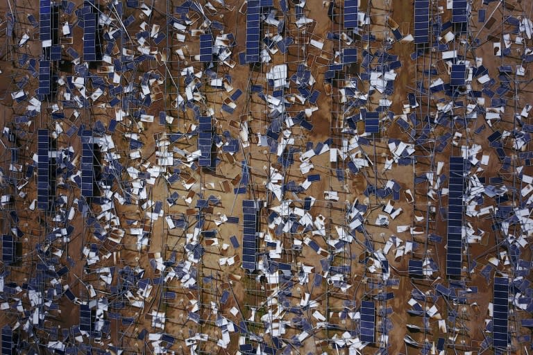 Solar panels are left scattered in the wake of Hurricane Maria in Humacao, Puerto Rico in this October 02, 2017 file photo