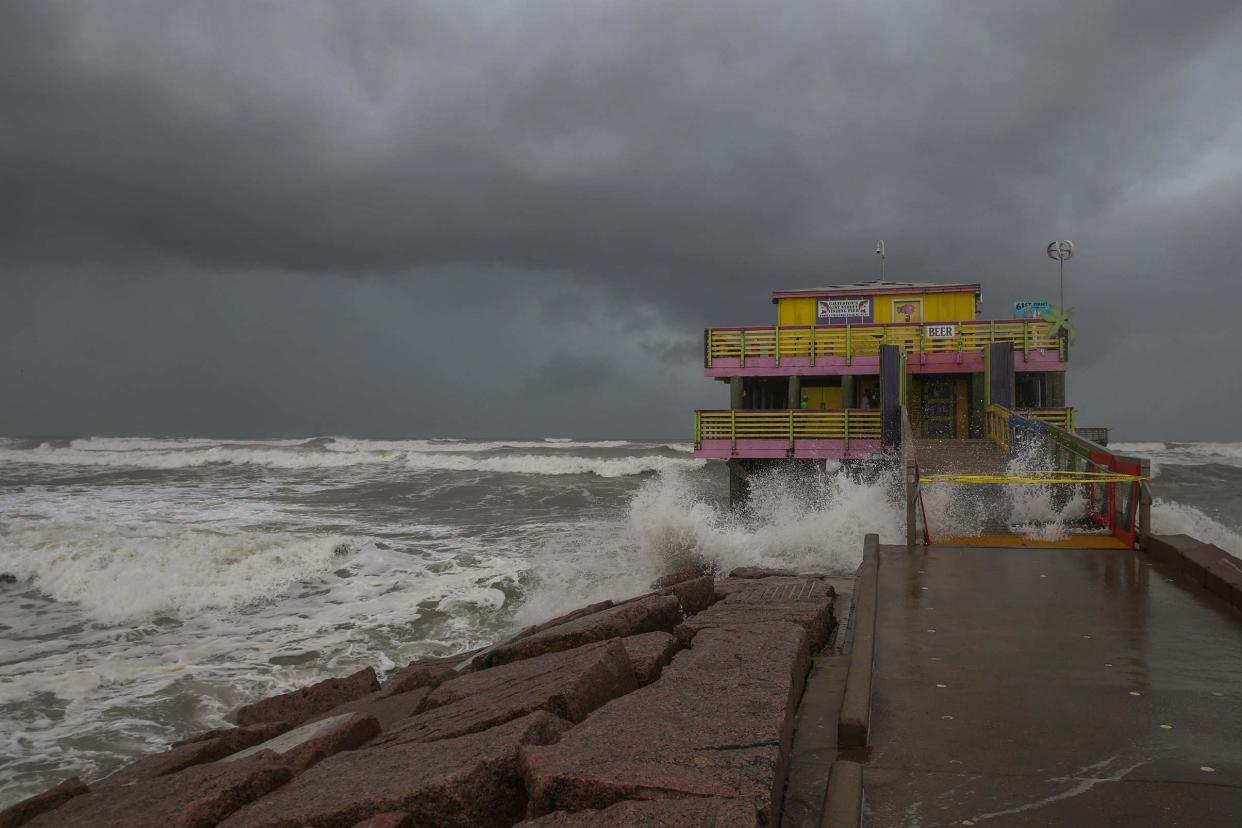 Waves from Hurricane Laura crash on the 61st Street fishing pier on August 25, 2020 in Galveston, Texas: Getty Images