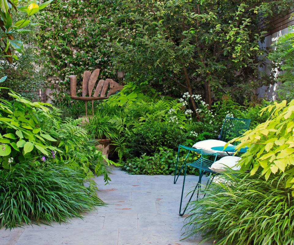 Terrace with chair and sculpture