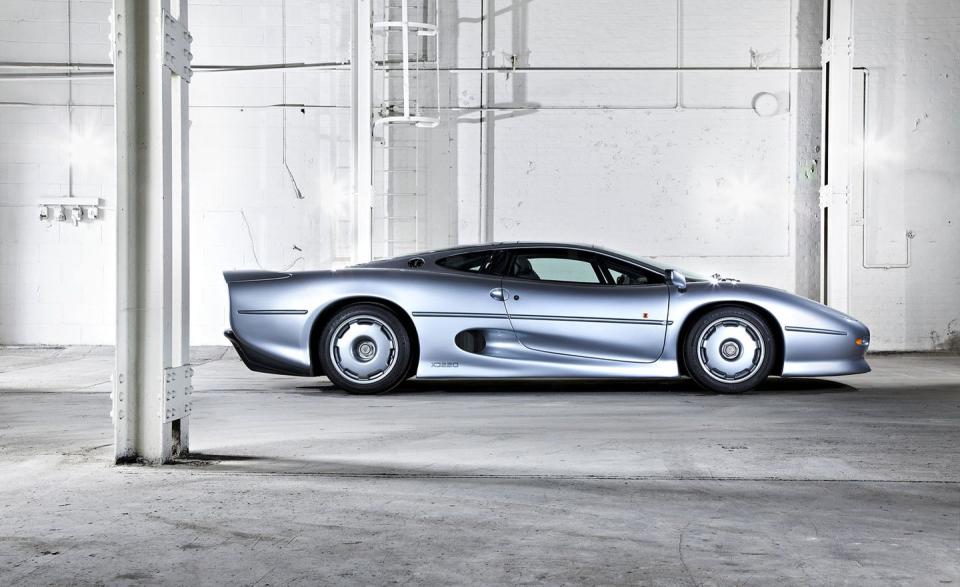 When the production model arrived in 1992, it had undergone a massive transformation. The Jaguar XJ220 had lost its all-wheel-drive system in favor of rear-wheel drive, and the V-12 was replaced by a turbocharged V-6.