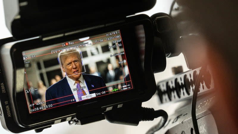 Former President Donald Trump, seen through a camera viewfinder, speaks to members of the media at Manhattan criminal court in New York, on Thursday, May 2, 2024.