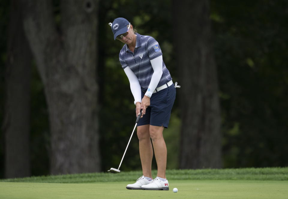 Canada's Alena Sharp putts on the sixth hole during the first round of the CP Women's Open golf tournament, Thursday, Aug. 25, 2022, in Ottawa, Ontario. (Adrian Wyld/The Canadian Press via AP)