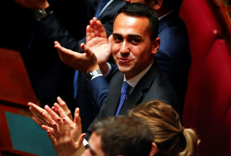 Five Stars Movement (M5S) leader Luigi Di Maio applauses the new Chamber of Deputies president Roberto Fico during the second session day since the March 4 national election in Rome, Italy March 24, 2018. REUTERS/Tony Gentile