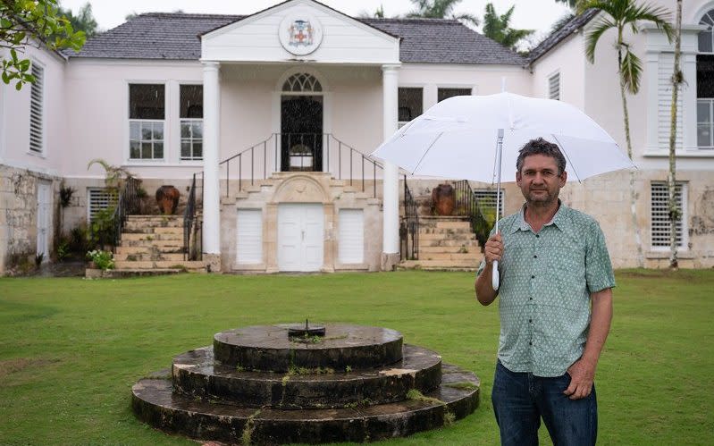 Blaise Hart stood in front of the mansion