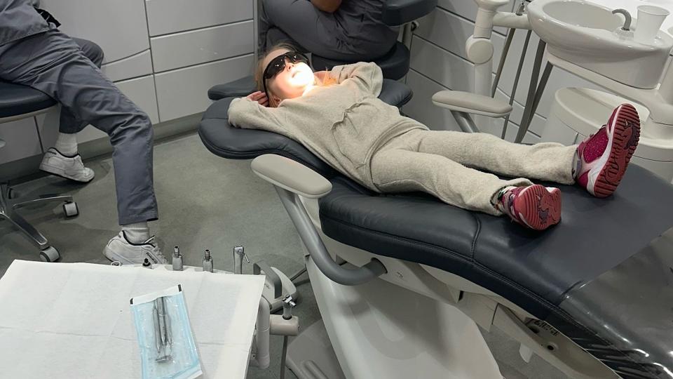 Mia in dentist chair