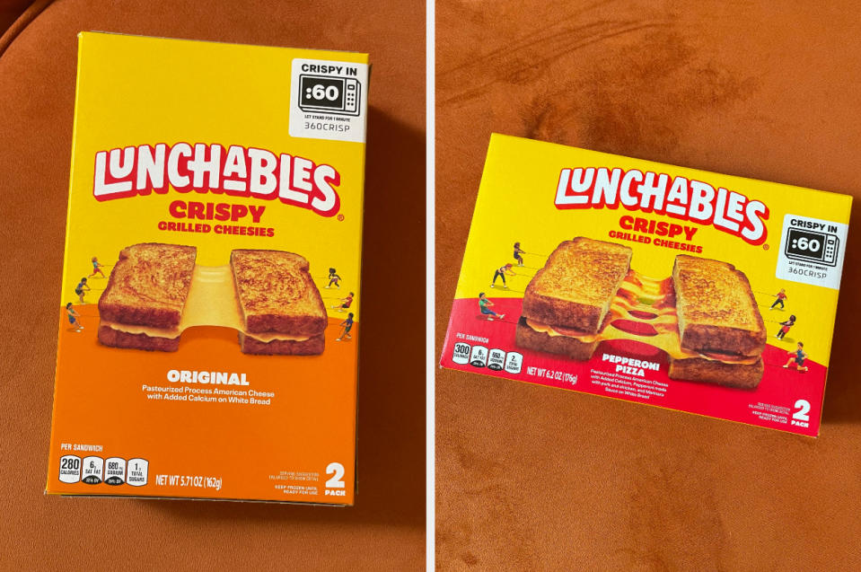 Two Lunchables Crispy Grill Cheeses boxes featuring original and pepperoni pizza flavors on an orange surface