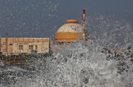 Sea waves hit the rocks as Kudankulam nuclear power project plant is seen in the background in the southern Indian state of Tamil Nadu, September 13, 2012. REUTERS/Adnan Abidi/File photo