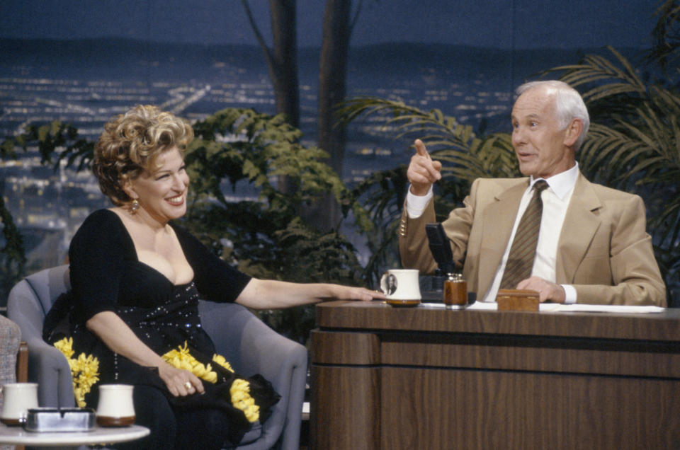 THE TONIGHT SHOW STARRING JOHNNY CARSON -- Aired 05/21/1992 -- Pictured: (l-r) Actress Bette Midler during an interview with host Johnny Carson on May 21, 1992 -- Photo by: Alice S. Hall/NBCU Photo Bank via Getty Images