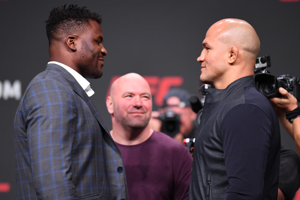 ATLANTA, GA - APRIL 12:  (L-R) Francis Ngannou of Cameroon and Junior Dos Santos of Brazil Dos Santos face off during the UFC Seasonal Press Conference inside State Farm Arena on April 12, 2019 in Atlanta, Georgia. (Photo by Josh Hedges/Zuffa LLC/Zuffa LLC via Getty Images)