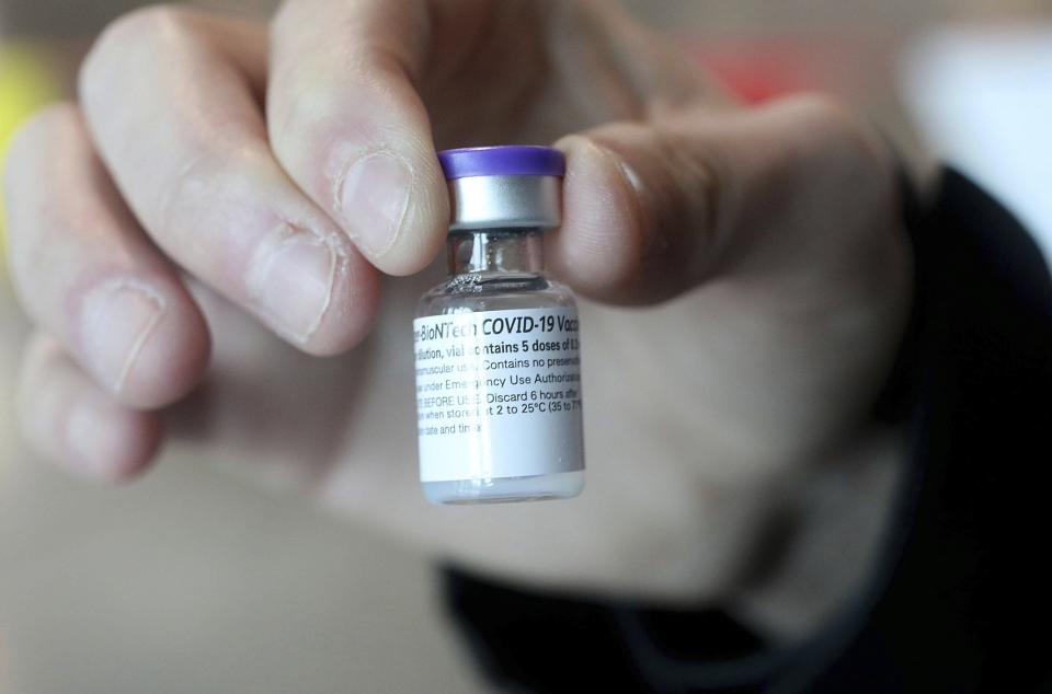 A vial of Pfizer-BioNTech COVID-19 vaccine is shown on Tuesday, Dec. 15, 2020, in Tulsa , Okla.