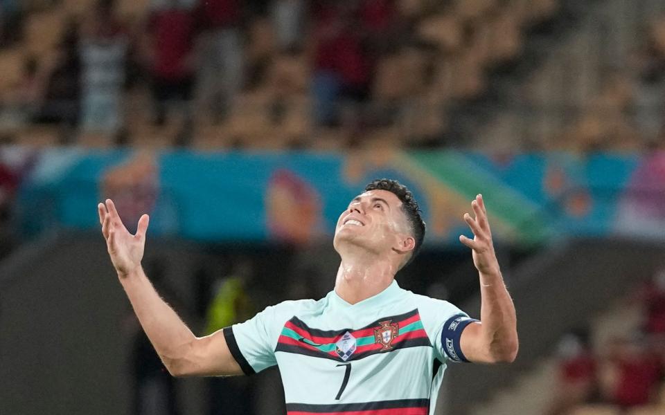 Portugal's forward Cristiano Ronaldo reacts during the UEFA EURO 2020 - THANASSIS STAVRAKIS/POOL/AFP via Getty Images