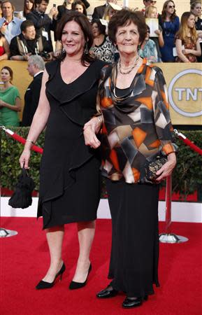 Philomena Lee (R) and her daughter Jane arrive at the 20th annual Screen Actors Guild Awards in Los Angeles, California in this January 18, 2014 file photo. REUTERS/Lucy Nicholson/Files