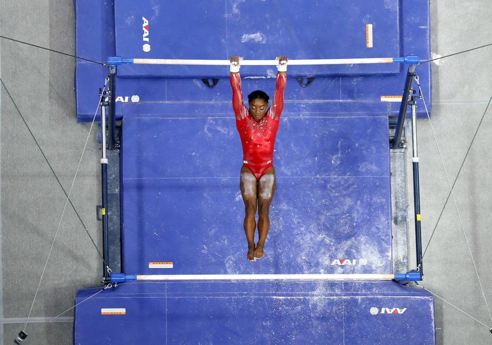 Simone Biles competes on the uneven bars during the 2021 U.S. Gymnastics Olympic Trials at America’s Center on June 27, 2021, in St Louis, Missouri.