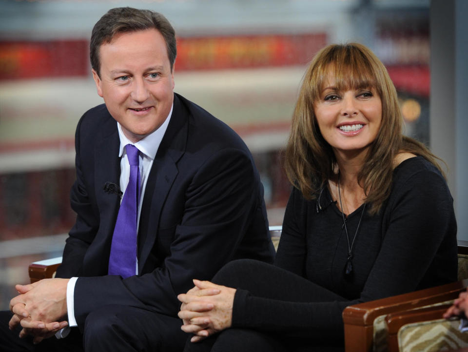 Prime Minister David Cameron appears on the BBC1's The Andrew Marr show in Birmingham with newspaper reviewer Carol Vorderman, ahead of the start of this year's Annual Conservative Party Conference.   (Photo by Stefan Rousseau/PA Images via Getty Images)