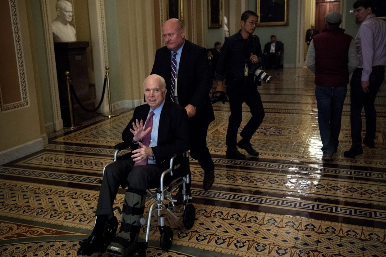 Senator John McCain uses a wheelchair on Capitol Hill: BRENDAN SMIALOWSKI/AFP/Getty Images