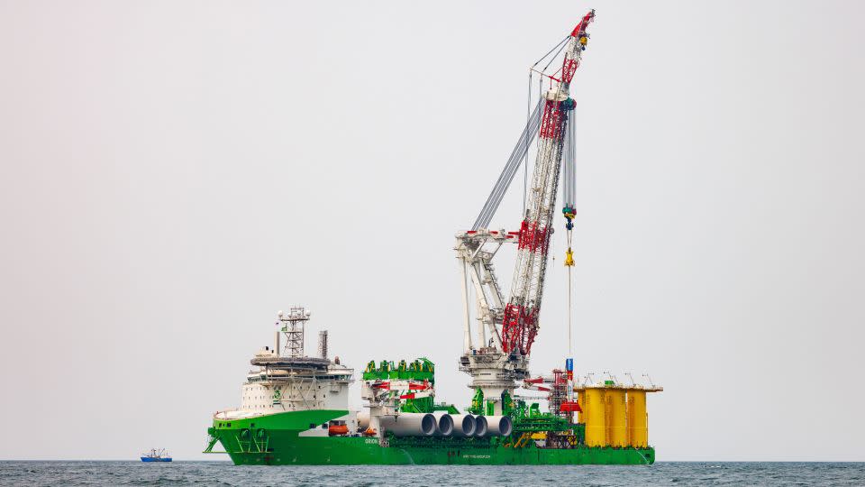 A specialized ship installs the first foundations for the Vineyard Wind near Martha's Vineyard on June 5. - Bob O'Connor/The New York Times/Redux