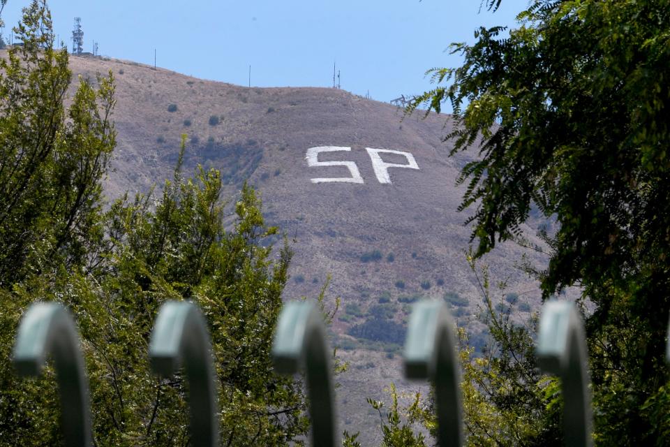 The giant "SP" on South Mountain above Santa Paula, seen Tuesday, was brightened after workers cleared brush and repainted faded stones last week.