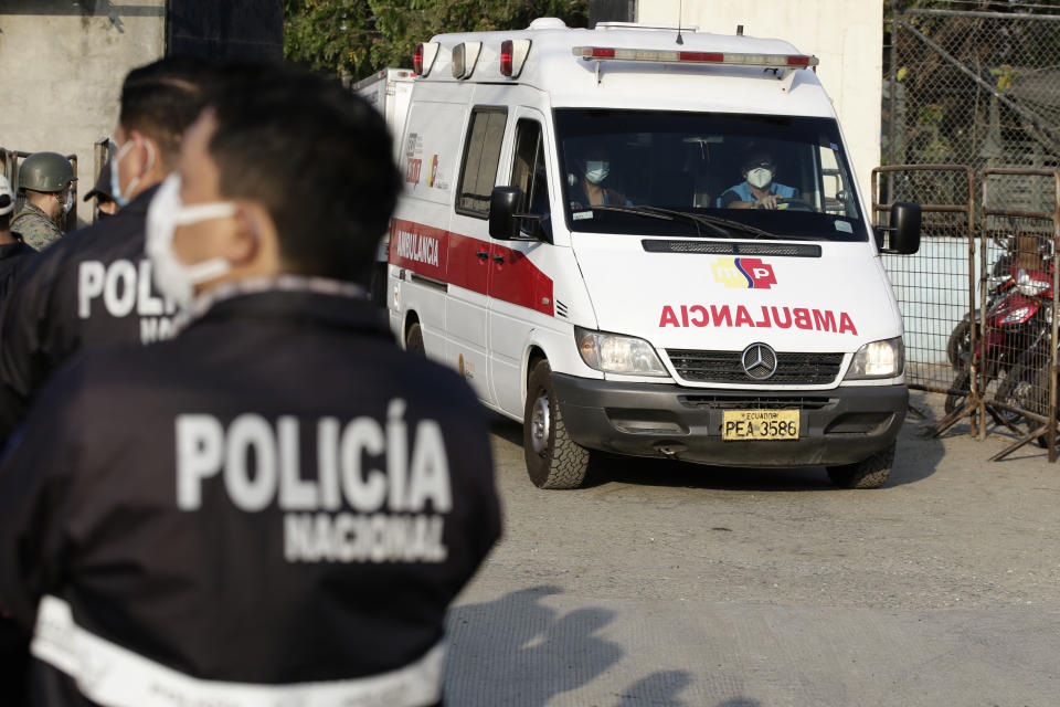 An ambulance leaves from the Litoral Penitentiary in Guayaquil, Ecuador, Wednesday, September 29, 2021. The authorities report at least 100 dead and 52 injured in a riot on Tuesday at the prison. (AP Photo/Angel DeJesus)