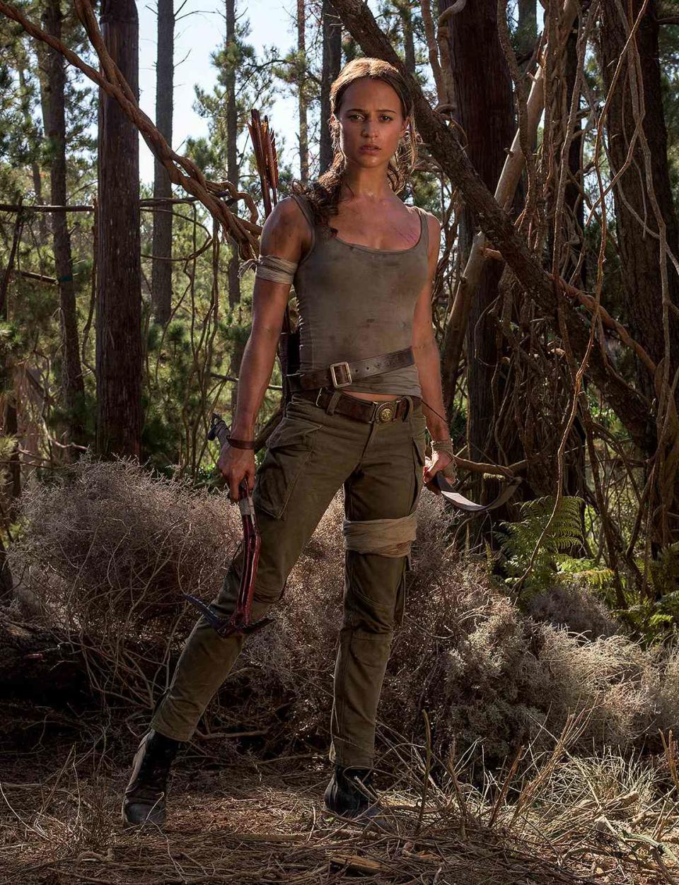 ALICIA VIKANDER as Lara Croft i