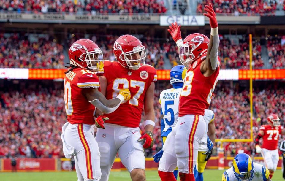 Kansas City Chiefs tight end Travis Kelce (87) celebrates a touchdown with running back Isiah Pacheco (10) and tight end Jody Fortson (88) during an NFL football game against the Los Angeles Rams at Arrowhead Stadium on Sunday, Nov. 27, 2022 in Kansas City.