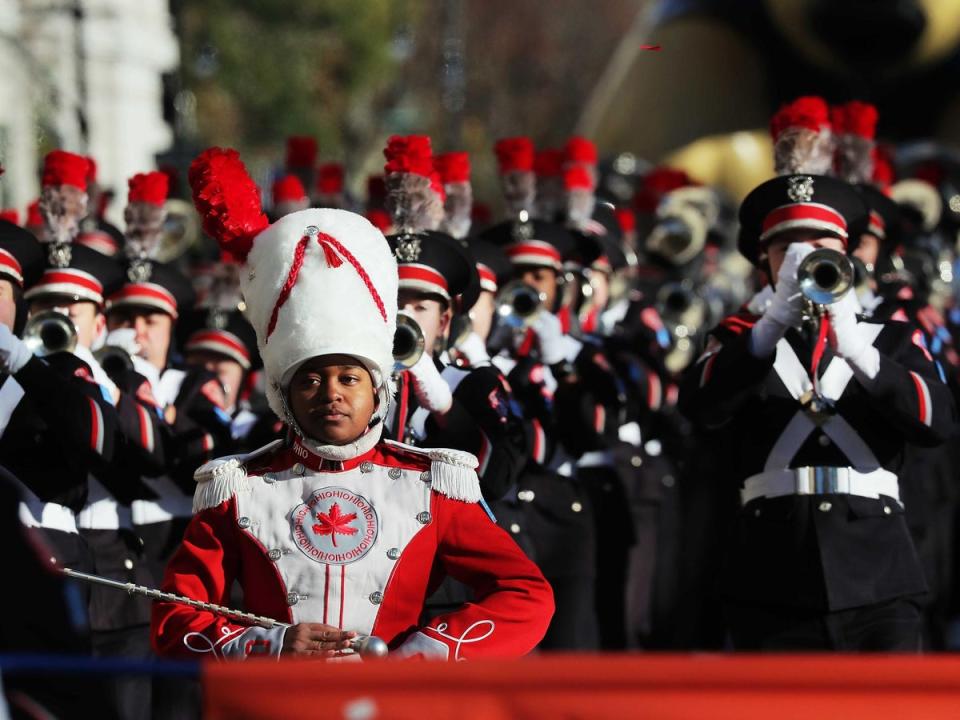 A marching band takes part in the parade (Reuters)