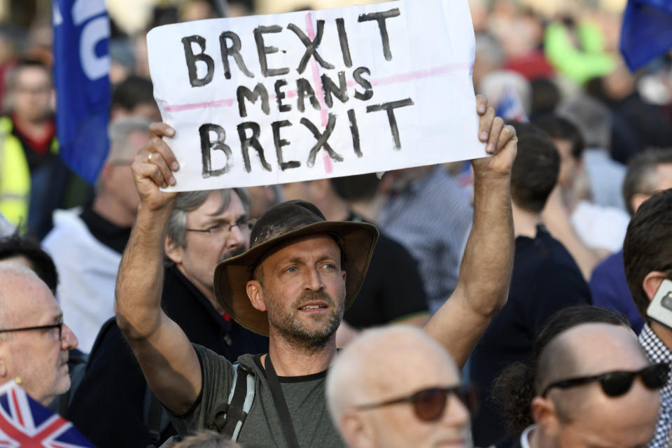 A protester seen holding a placard that says �Brexit means Brexit" during the Leave means leave rally in London. A Leave means leave pro Brexit march begun on March 16 in Sunderland, UK and ended with a rally in Parliament Square on March 29 in London, same day that UK has been scheduled to leave the European Union. Pro Brexit protesters gathered at Parliament Square to demand from the government to deliver what was promised and leave the European Union without a deal. Nigel Farage and Tommy Robinson were seen giving speeches to their supporters in different stages during the pro Brexit protest. (Photo by Andres Pantoja / SOPA Images/Sipa USA)