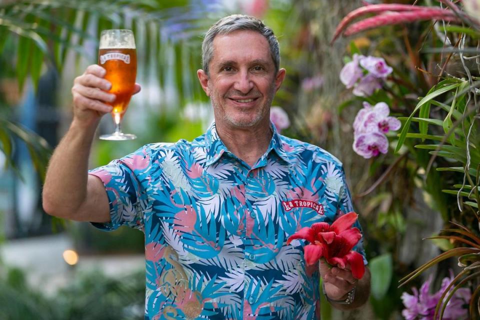 Manny Portuondo, the CEO of Cerveceria La Tropical, holds a glass of La Original Amber Lager at the Wynwood taproom in 2021.