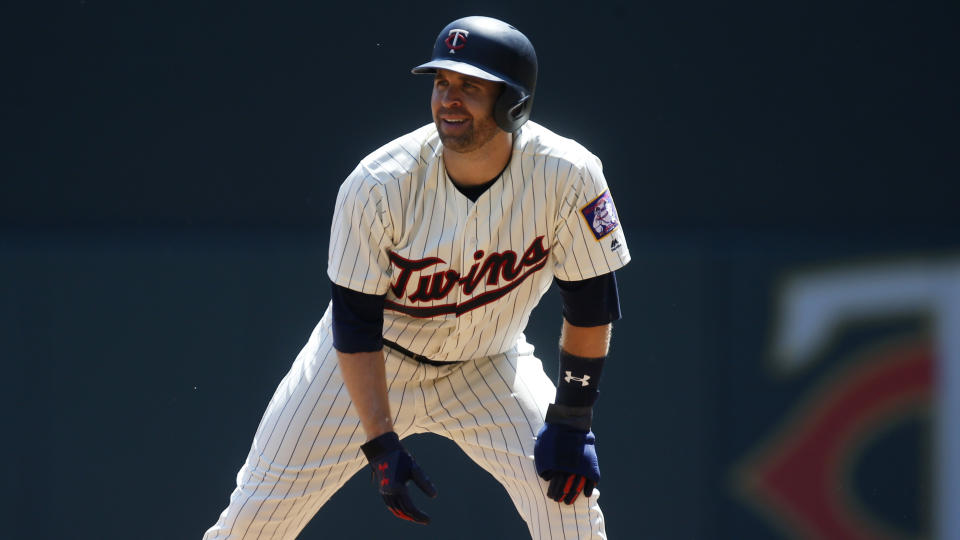 Despite struggles, fantasy owner should stick with Minnesota Twins’ Brian Dozier in the long run, says Michael Salfino. (AP Photo/Jim Mone)