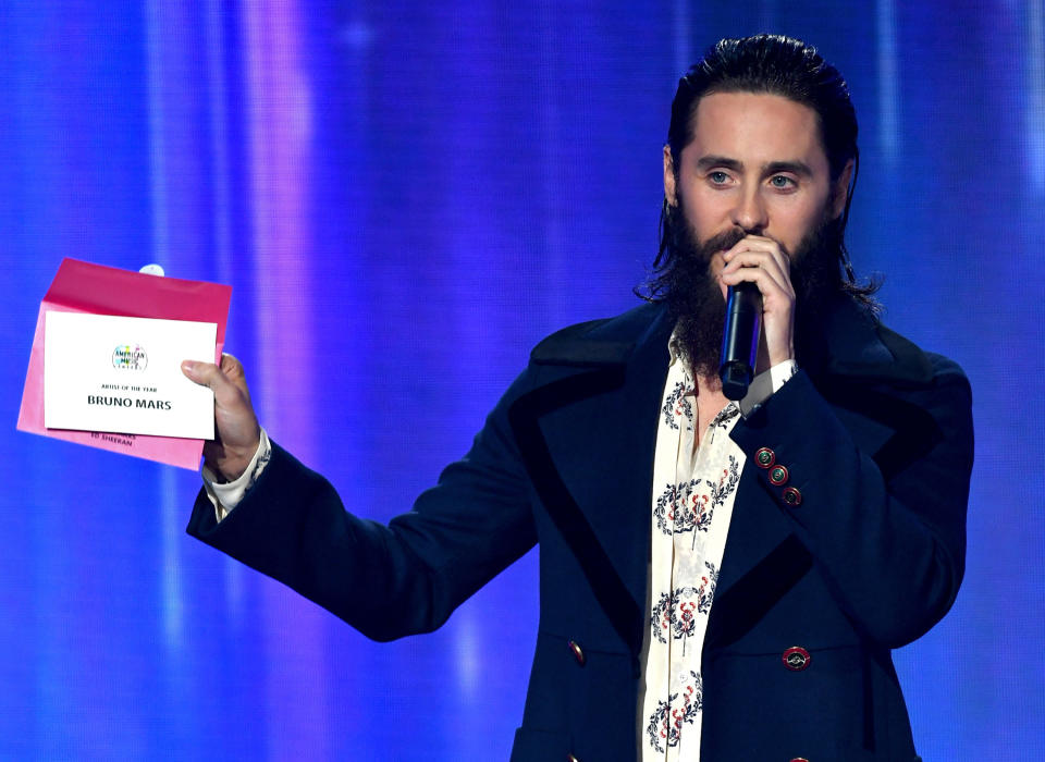 LOS ANGELES, CA - NOVEMBER 19:  Jared Leto speaks while revealing a card announcing Bruno Mars as the winner of the Artist of the Year award onstage during the 2017 American Music Awards at Microsoft Theater on November 19, 2017 in Los Angeles, California.  (Photo by Kevin Winter/Getty Images)