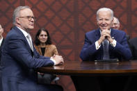 FILE - President Joe Biden participates in a meeting with Australian Prime Minister Anthony Albanese, left, and British Prime Minister Rishi Sunak at Naval Base Point Loma, March 13, 2023, in San Diego. Biden has an ambitious agenda when he sets off later this week on an eight-day trip to the Indo-Pacific. For part of his trip Biden will travel to Australia for a summit with fellow Quad leaders Australian Prime Minister Anthony Albanese, Indian Prime Minister Narendra Modi and Japanese Prime Minister Fumio Kishida. (AP Photo/Evan Vucci, File)