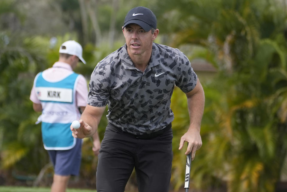 Rory McIlroy of Northern Ireland shows his ball after making a birdie putt on the seventh hole during the first round of the Cognizant Classic golf tournament, Thursday, Feb. 29, 2024, in Palm Beach Gardens, Fla. (AP Photo/Marta Lavandier)