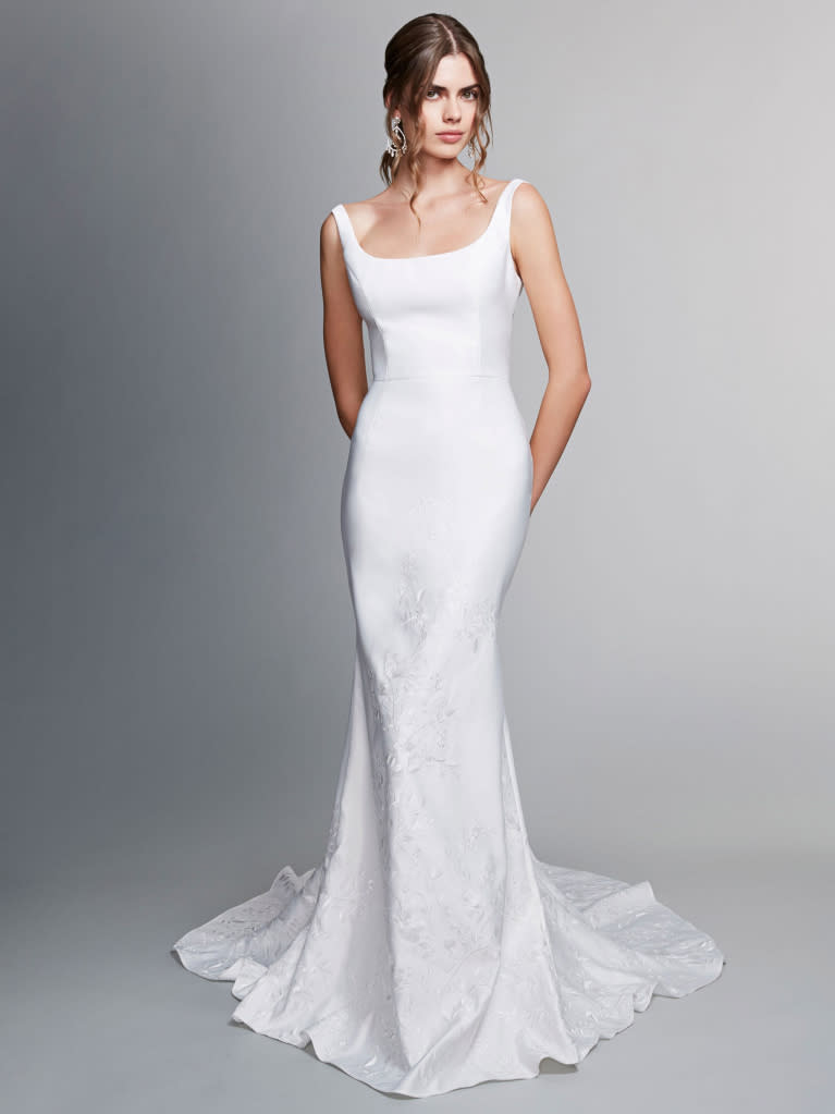<p>The creatives at <a href="https://www.marchesa.com/collections/bridal" rel="nofollow noopener" target="_blank" data-ylk="slk:Marchesa;elm:context_link;itc:0;sec:content-canvas" class="link ">Marchesa</a> consistently look towards unexpected, age-old architecture and materials (think French stone, gold, and woodwork) when curating each series of wedding dresses. We love the structure of the "Anna" gown, a weightless number with a wide square neckline and whimsical skirt, dotted with botanical vines. </p>