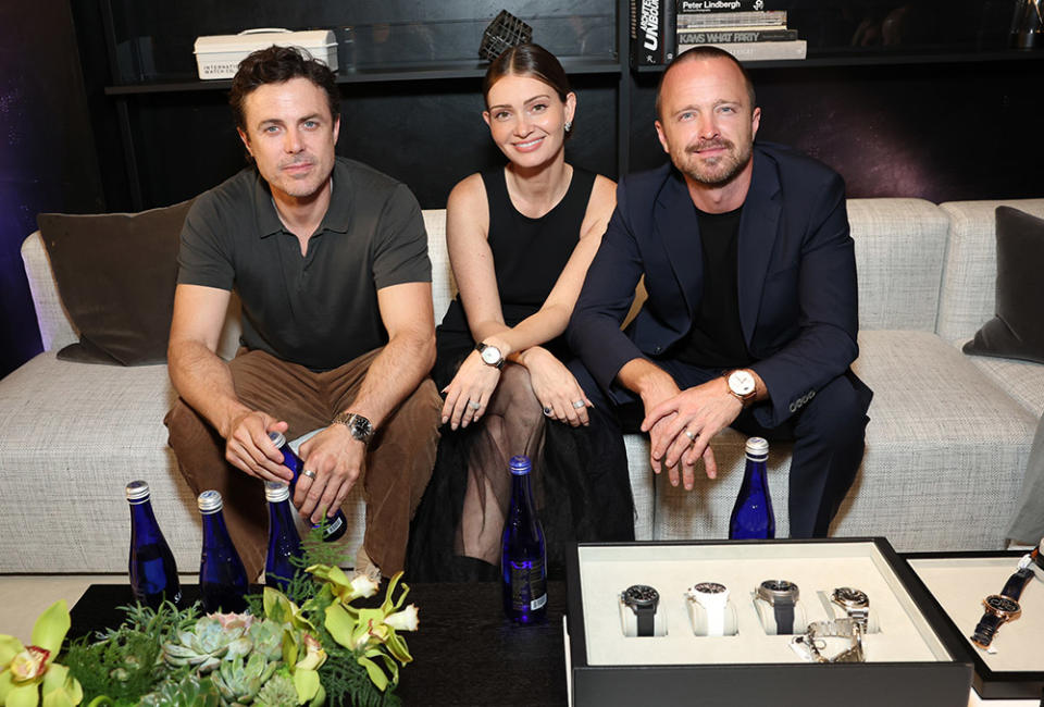 (L-R) Casey Affleck, Lauren Parsekian, and Aaron Paul attend the IWC Schaffhausen Rodeo flagship re-opening at IWC Boutique on October 05, 2023 in Beverly Hills, California.